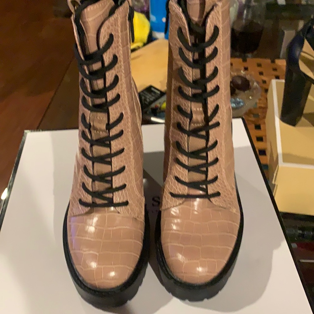 These Guess boots are brand new! Size 9